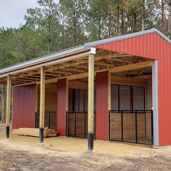 A red Amish horse barn built by The Amish Tradesmen LLC in Seaford, Delaware.