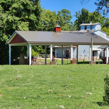 A pavillion with a cupola & weather vane built by The Amish Tradesmen LLC.